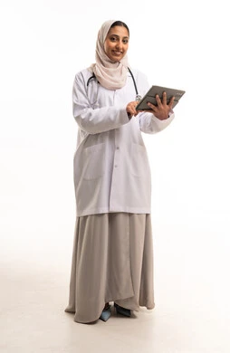 Saudi Female Doctor with Tablet on White Background