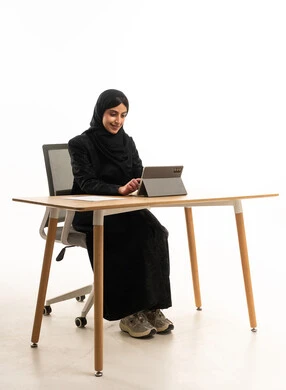 Saudi Businesswoman Working on Tablet in Studio