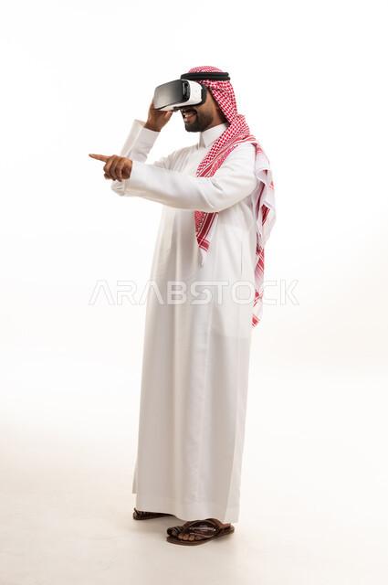 Saudi Man Wearing VR Headset on White Background