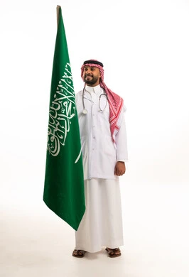 Saudi Male Doctor with National Flag in Studio