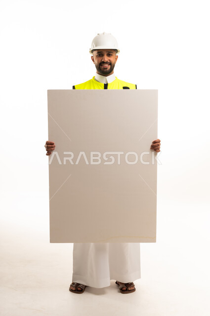 Saudi Engineer in Thobe Holding Blank White Board