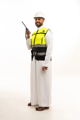 Saudi Engineer in Safety Gear with Walkie-Talkie