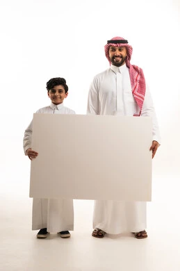 Saudi Man and Boy Holding Blank White Sign in Studio