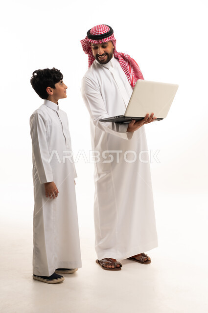 Saudi Man and Boy with Laptop on White Background