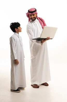 Saudi Man and Boy with Laptop on White Background