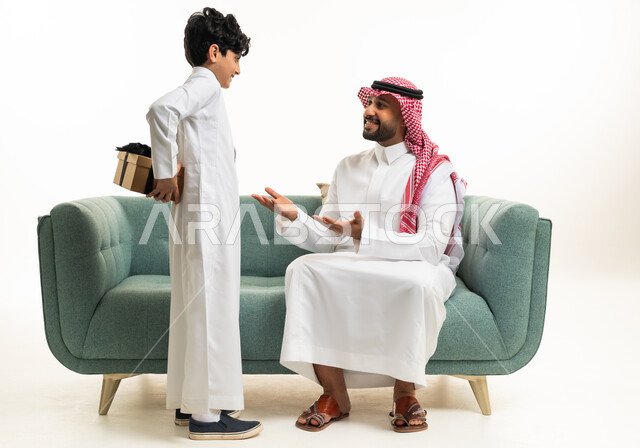 Saudi Father and Son with Surprise Gift Indoor