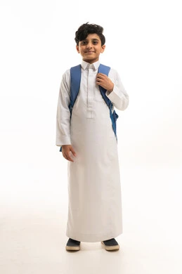 Saudi Boy in Traditional Thobe with School Backpack