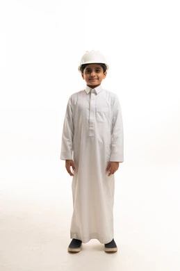Saudi Boy in Thobe Wearing Construction Safety Helmet
