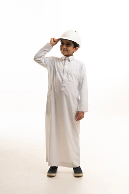 Saudi Boy in Thobe Wearing Construction Safety Helmet