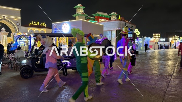 موكب المؤدين في القرية العالمية دبي ليلاً