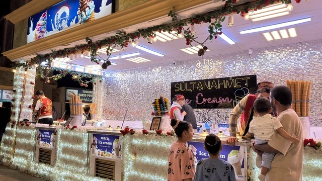 Turkish Ice Cream Stall at Night with Customers