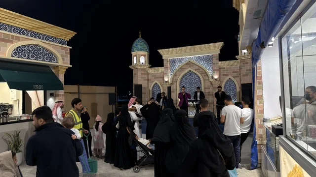 People at Outdoor Night Festival in Saudi Arabia