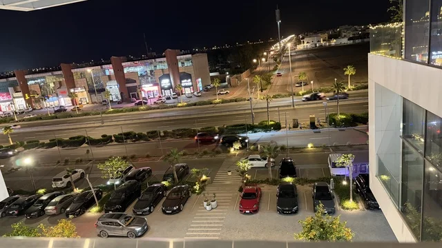 Modern Urban Commercial Parking Lot at Night