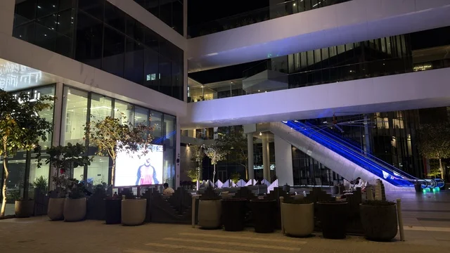 Modern Commercial Plaza Architecture at Night