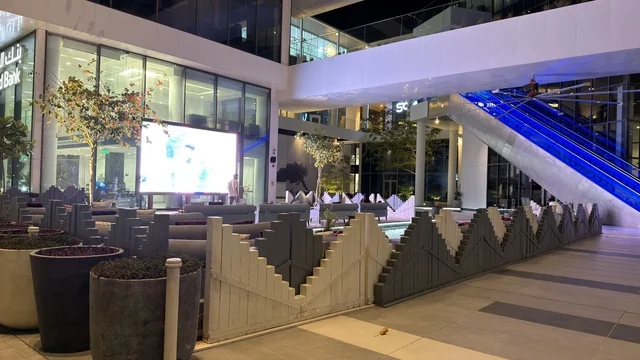 Modern Commercial Plaza Night Scene with LED Screen