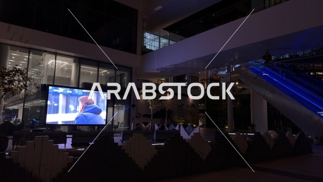 Digital Screen in Modern Commercial Building at Night