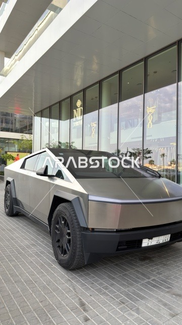 Tesla Cybertruck Parked in Front of Dubai Building
