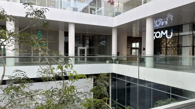 Modern Multi-Level Commercial Complex with Glass Railings Modern Multi-Level Commercial Complex with Glass Railings