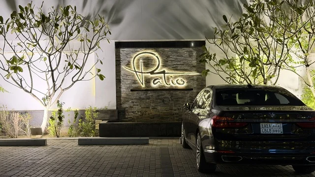 Luxury Sedan at Patio Entrance Night View