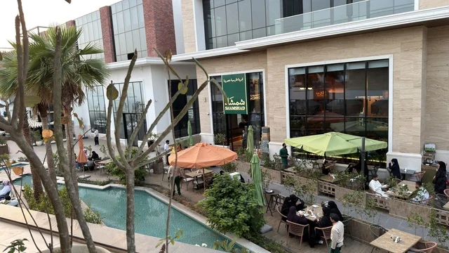 Outdoor Restaurant Plaza with Waterway and Dining