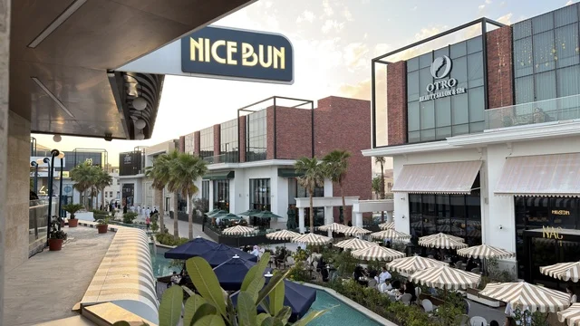Modern Outdoor Shopping Plaza with Restaurant Seating