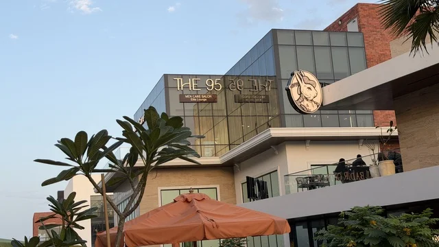 Modern Commercial Building with Outdoor Seating Terrace