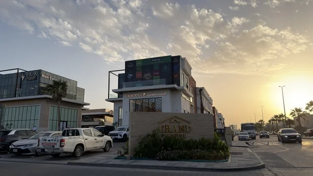 Grand Plaza Commercial Building at Sunset