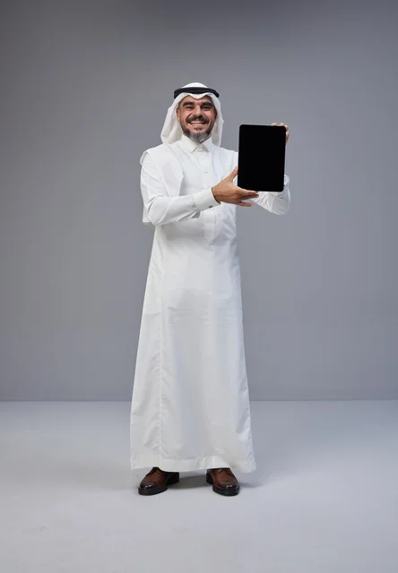 Saudi Man Holding Digital Tablet with Blank Screen
