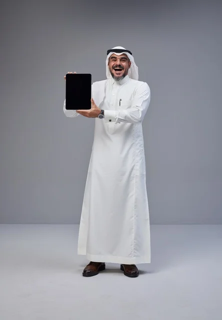 Saudi Man Holding Digital Tablet with Blank Screen