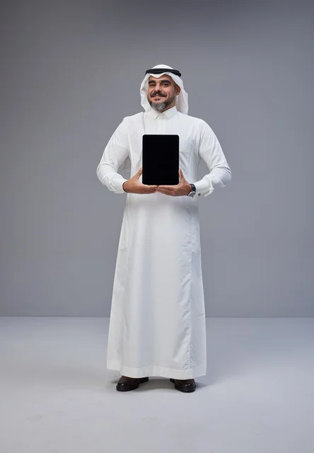 Saudi Man Holding Tablet Blank Screen in Studio