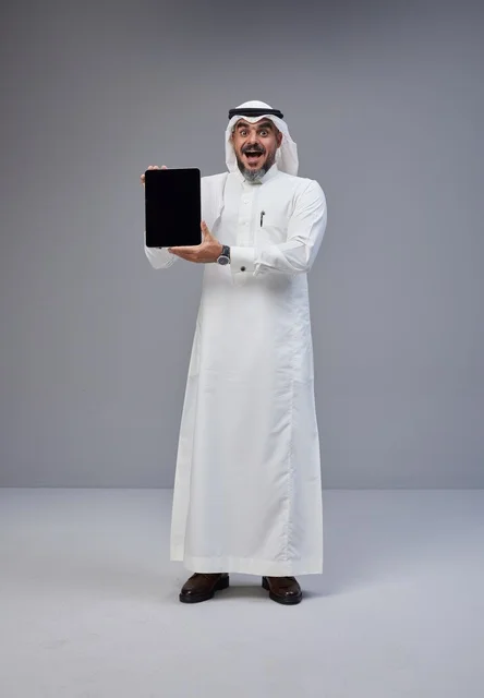 Saudi Man Holding Tablet with Blank Screen
