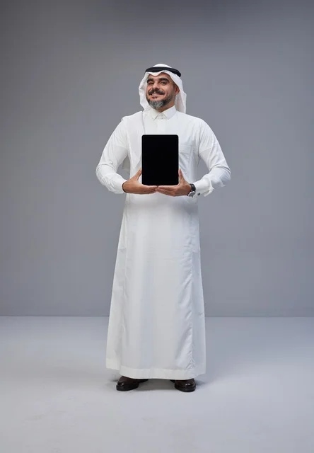 Saudi Man Holding Digital Tablet with Blank Screen