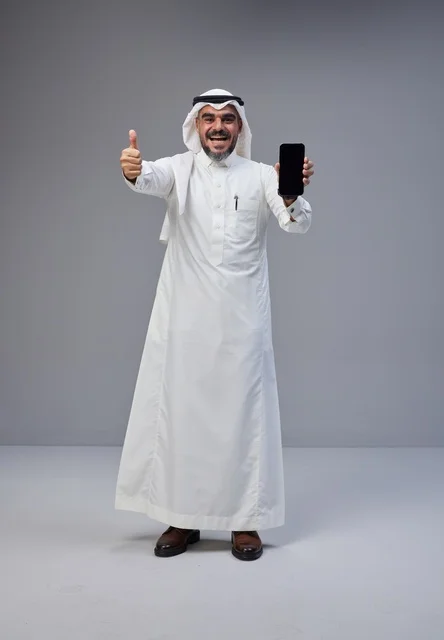 Saudi Man Holding Blank Smartphone Screen with Thumbs Up