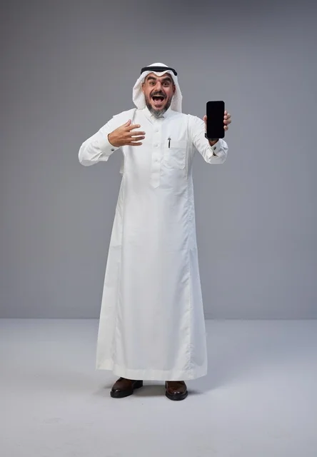 Excited Saudi Man Holding Blank Smartphone Screen