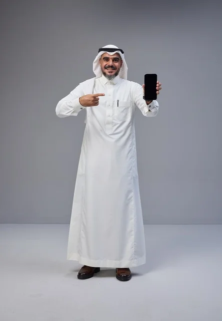 Saudi Man Holding Smartphone with Blank Screen