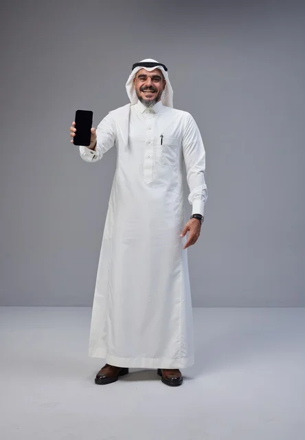 Saudi Man Holding Smartphone with Blank Screen