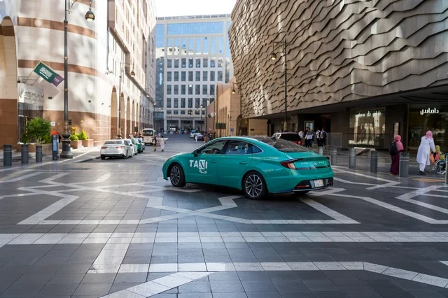 Green Taxi in Medina Saudi Arabia Urban Street View