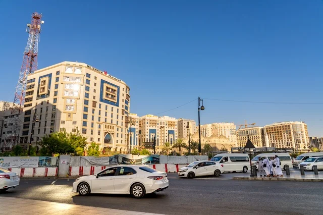 Medina Saudi Arabia Street View with Hotels and Traffic