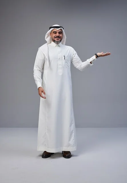Saudi Man in Traditional Thobe Gesturing in Studio