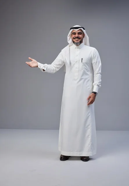Saudi Man in Traditional Thobe Gesturing in Studio
