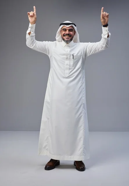 Saudi Man in Traditional Dress Pointing Upwards