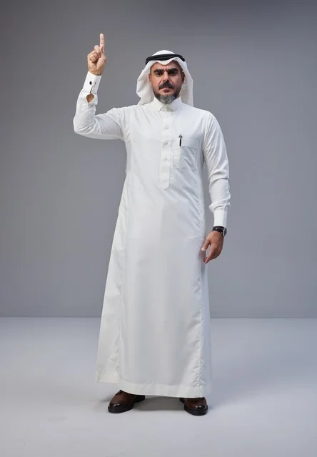 Saudi Man in Traditional Thobe Pointing Upward