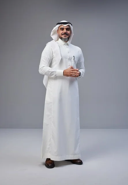Saudi Man in Traditional Thobe Standing in Studio