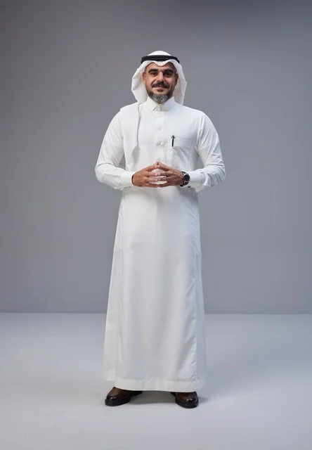 Saudi Man in Traditional Thobe Standing in Studio