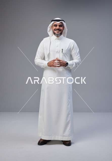 Saudi Man in Traditional Thobe Standing in Studio