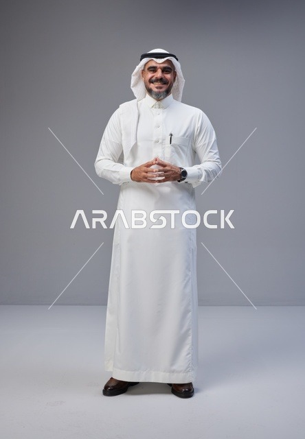 Saudi Man in Traditional Thobe Standing in Studio