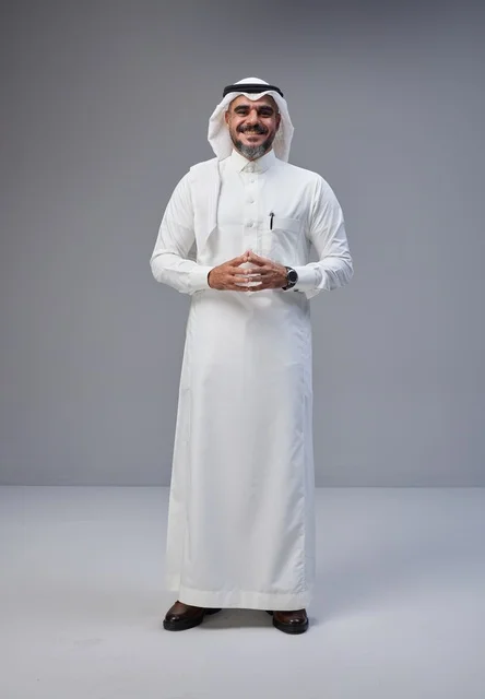 Saudi Man in Traditional Thobe Standing in Studio