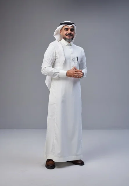 Saudi Man in Traditional Thobe Standing in Studio