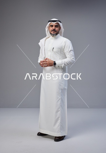 Saudi Man in Traditional Thobe Standing in Studio