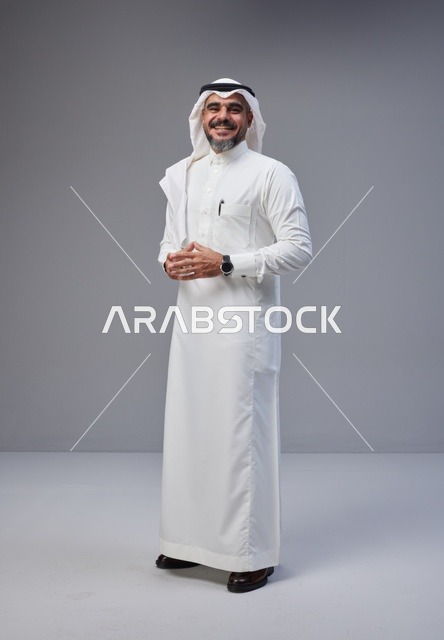 Saudi Man in Traditional Thobe Standing in Studio